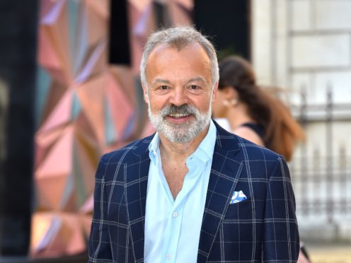 Graham Norton has slammed ‘short-sighted’ celebrities who avoid paying tax (Matt Crossick/PA)