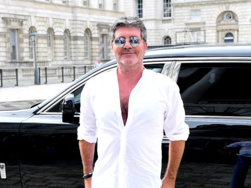 Simon Cowell is set to hear an audition from a familiar face on The X Factor (Ian West/PA)