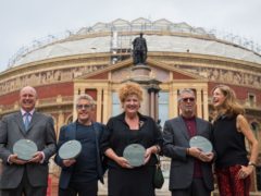 From left to right, Randolph Churchill, Roger Daltrey, Eve Ferret of Chelsea Arts Club, Eric Clapton and Katie Derham outside the Royal Albert Hall, London (Dominic Lipinski/PA)
