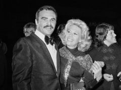Actress Dinah Shore and Burt Reynolds appear together in Los Angeles in 1971 (Harold Filan/AP)