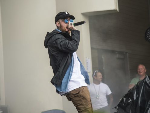 Mac Miller performs at Lollapalooza in Chicago in 2016 (Amy Harris/Invision/AP)