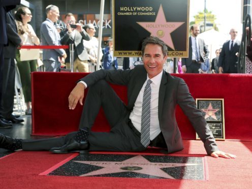 Will & Grace star Eric McCormack with his star (Willy Sanjuan/Invision/AP)