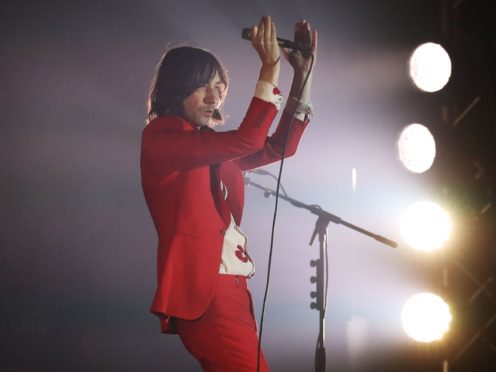 Lead singer of Primal Scream Bobby Gillespie performs at Slessor Gardens in Dundee (Andrew Milligan/PA)