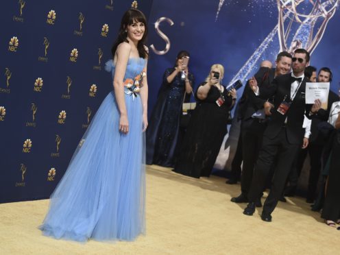 Michelle Dockery arrives at the 70th Primetime Emmy Awards (Jordan Strauss/Invision/AP)