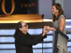 Glenn Weiss proposes to his girlfriend (Phil McCarten/Invision for the Television Academy/AP Images)
