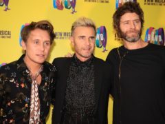 Mark Owen, Gary Barlow, and Howard Donald of Take That (PA)