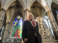 David Hockney in front of The Queen’s Window at Westminster Abbey (Victoria Jones/PA)