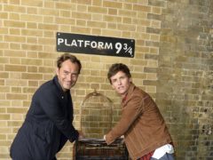 Eddie Redmayne and Jude Law celebrate Back To Hogwarts Day at King’s Cross (Warner Bros)