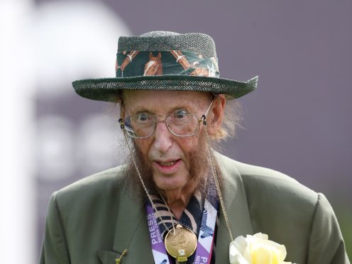 John McCririck during ladies day of the 2018 Investec Derby Festival at Epsom Downs Racecourse, Epsom. PRESS ASSOCIATION Photo. Picture date: Friday June 1, 2018. See PA story RACING Epsom. Photo credit should read: David Davies/PA Wire. RESTRICTIONS: Editorial use only � any intended commercial use is subject to prior Epsom Downs Racecourse approval. No Private Sales.