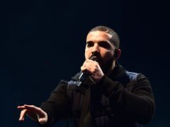 Drake waved an Ireland flag as he supported Conor McGregor at the fighter’s weigh-in ahead of a highly anticipated fight this weekend (Ian West/PA)