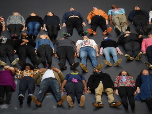 Guests lie on Tania Bruguera’s Hyundai Commission, a heat-sensitive floor (Kirsty O’Connor/PA)