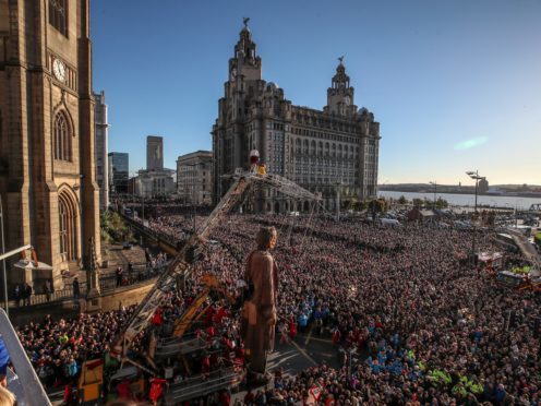 The Royal De Luxe theatre company’s puppets the Giants perform in Liverpool (Peter Byrne/PA)