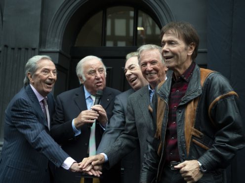 Des O’Connor, Jimmy Tarbuck, Lord Lloyd Webber, Tommy Steele and Sir Cliff Richard push the button for the curtain to drop (Victoria Jones/PA)