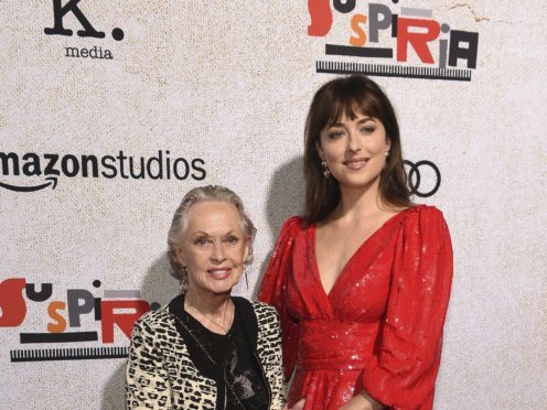 Dakota Johnson posed alongside her grandmother and Hollywood royalty Tippi Hedren at the premiere of her latest film (Chris Pizzello/Invision/AP)