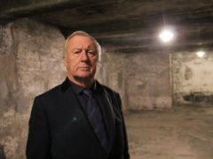 Chris Tarrant inside a gas chamber in Auschwitz (Channel 5)