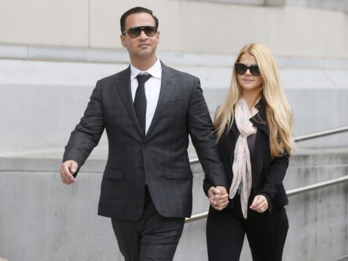 Michael ‘The Situation’ Sorrentino leaves federal court with his fiancee Lauren Pesce (Aristide Economopoulos/NJ Advance Media via AP, File)