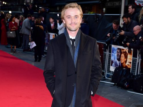 Tom Felton has said he does not try to distance himself from the character of Draco Malfoy (Ian West/PA)