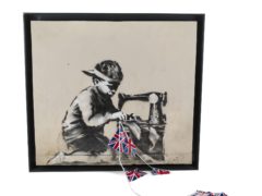 An American artist paid 730,000 US dollars (£561,000) for a Banksy artwork painted on the side of a North London Poundland (Julien’s Auctions/PA)