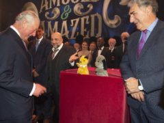 The Prince of Wales meets Sooty and Sweep, with actor Jim Carter, at a gala night of comedy and magic celebrating Charles’ 70th birthday (Julian Simmonds/The Daily Telegraph)