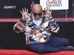 Quincy Jones dipped his hands and feet in cement outside Hollywood’s Chinese Theatre (Richard Shotwell/Invision/AP)