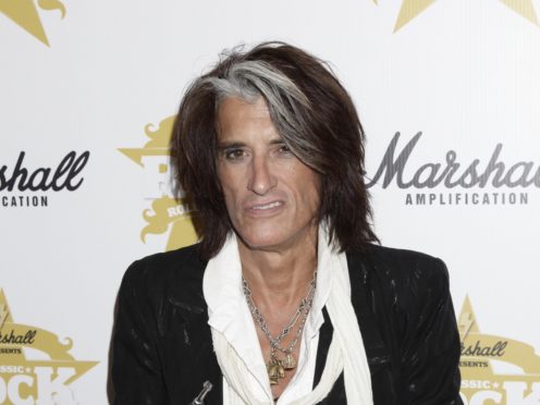 Joe Perry had felt short of breath on stage (Yui Mok/PA)