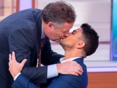 Morgan surprised Andre with a kiss on the lips during Good Morning Britain (REX).