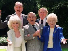 Veteran ‘Carry On’ film stars Jack Douglas (back left), Leslie Phillips (right rear), Barbara Windsor (front left) and June Whitfield with guest and comic actor Norman Wisdom, centre, (who did not star in any of the films) at a 40th Anniversary reunion in 1998 (Fiona Hanson/PA)