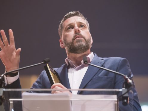 Radio host Iain Lee kept a suicidal caller on the line until an ambulance arrived (Danny Lawson/PA)