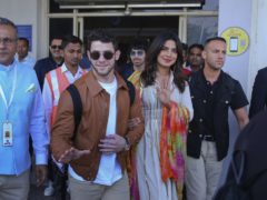 Bollywood actress Priyanka Chopra and musician Nick Jonas arrive at the airport in Jodhpur, Rajasthan, India, ahead of their wedding (AP Photo/Sunil Verma)