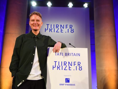 2018 Turner Prize winner Charlotte Prodger accepts the award during a ceremony at Tate Britain in London. (Victoria Jones/PA)