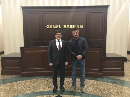 Yasin Aktay with US actor Sean Penn, in Ankara (Handout via AP)