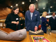 The Prince of Wales, patron of the British Film Institute (BFI), looking at archive material of actor Peter Sellers (Chris Jackson/PA)