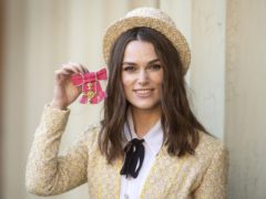 Keira Knightley with her OBE outside Buckingham Palace (Victoria Jones/PA)