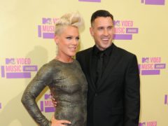 Carey Hart paid tribute to his wife Pink as the couple celebrated their 13th wedding anniversary (PA)