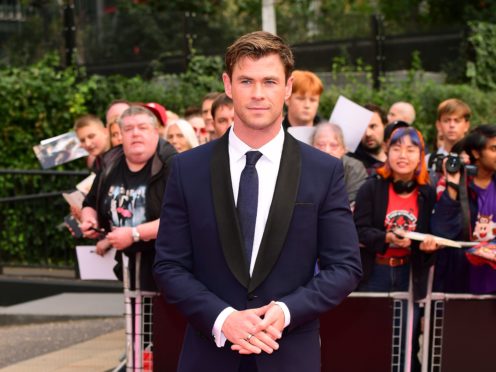 Chris Hemsworth has been bantering with Dwayne Johnson on Twitter (Ian West/PA)