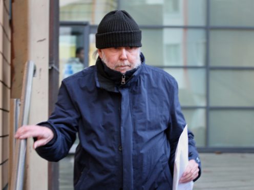Gordon Hawthorn, who who sent rape threats to a BBC presenter arrives at Bristol Crown Court (Ben Birchall/PA)