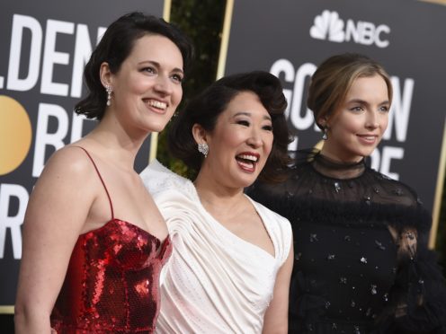 Phoebe Waller-Bridge, from left, Sandra Oh and Jodie Comer arrive at the 76th annual Golden Globe Awards at the Beverly Hilton Hotel on Sunday, Jan. 6, 2019, in Beverly Hills, Calif. (Photo by Jordan Strauss/Invision/AP)