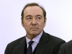 Kevin Spacey stands in district court (Nicole Harnishfeger/The Inquirer and Mirror via AP, Pool)