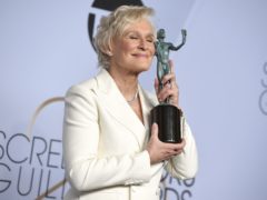 Glenn Close poses with her award (Photo by Jordan Strauss/Invision/AP)