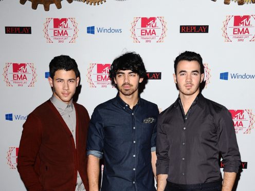 The Jonas Brothers a year before their split in 2013 (Ian West/PA)