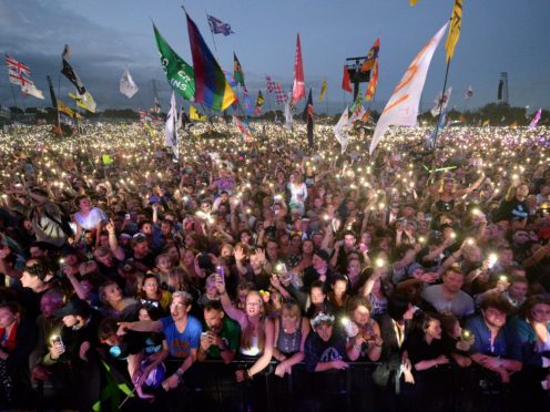 Single-use plastic bottles will no longer be sold at Glastonbury Festival (Ben Birchall/PA)