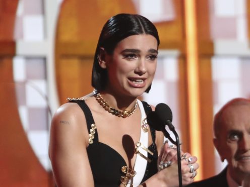 Dua Lipa accepts the award for best new artist (Matt Sayles/Invision/AP)