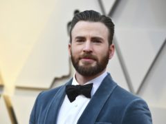 Chris Evans hailed a ‘gentleman’ as he helps Regina King up to Oscars stage (Jordan Strauss/AP)