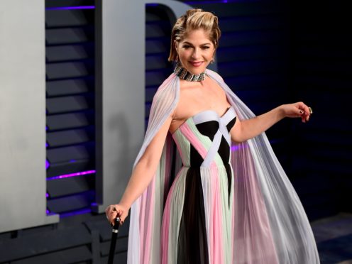 Selma Blair attending the Vanity Fair Oscar Party with her custom walking stick (Ian West/PA)