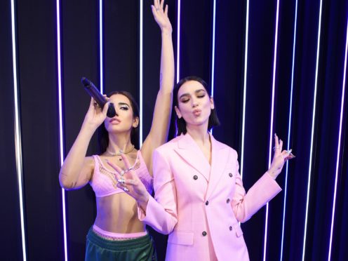 Dua Lipa poses with her waswork at Madame Tussauds (INHOUSE Images/PA)