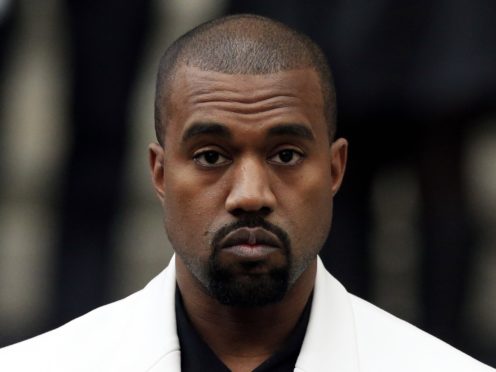 Kanye West is attempting to free himself from his record contract (Jonathan Brady/PA)