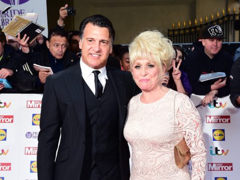 Dame Barbara Windsor and Scott Mitchell (Ian West/PA)