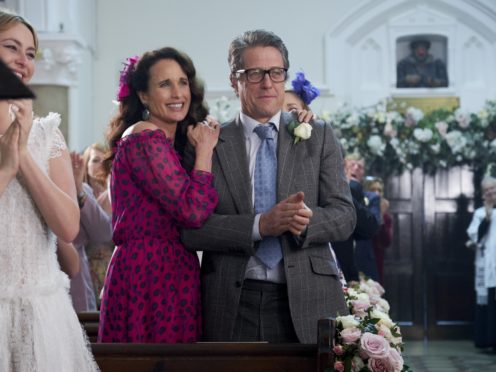 Andie Macdowell and Hugh Grant during the filming of of One Red Nose Day and a Wedding, one off special film that will premiere exclusively during Red Nose Day. (Comic Relief)