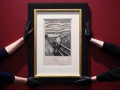 Gallery technicians install Edvard Munch’s The Scream at the British Museum in London (Kirsty O’Connor/PA)