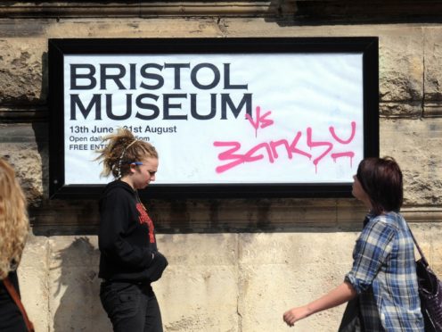 The painting Devolved Parliament. by graffiti artist Banksy, is going on show at Bristol Museum (Steve Parsons/PA)